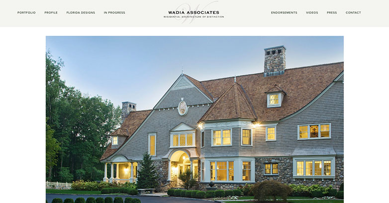 The homepage showcases a dazzling mansion, validating their commitment to excellence