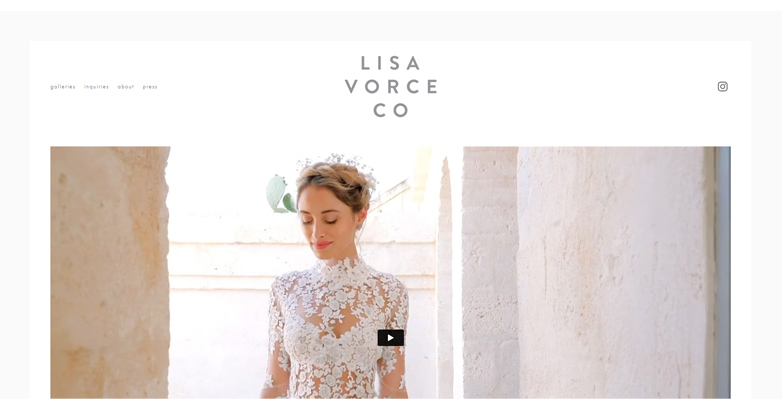 The Lisa Vorce website featuring a stunning video of a beautiful crafted wedding dress with a minimalist website design
