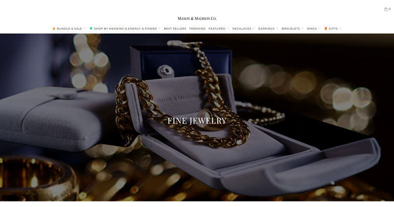 The elegance website of Mason Madison featuring large scale image of fine jewelry and minimalist navigation menu with luxury website design