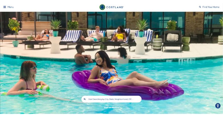 The Cortland’s site welcomes visitors with a lively video background that highlights vibrant, communal living.
