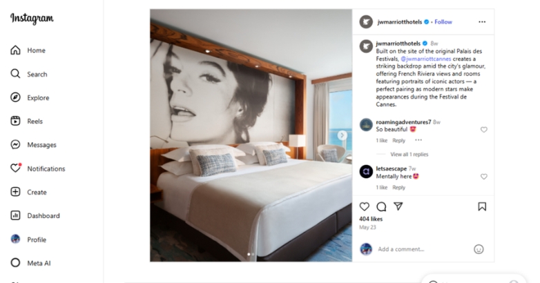 A hotel room featuring a bed and a wall adorned with a picture of a woman, ideal for social media promotion.
