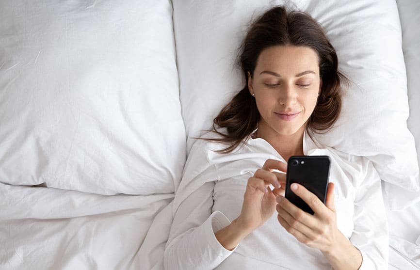 Woman scrolling hotel social media account