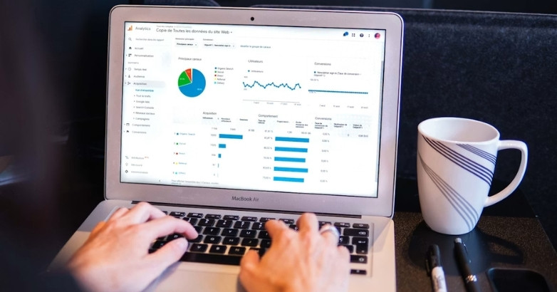 Travel agent reviewing marketing analytics and key performance, showcasing marketing strategies for travel agents