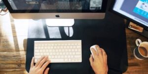 Hotel SEO campaign analysis at a desktop computer