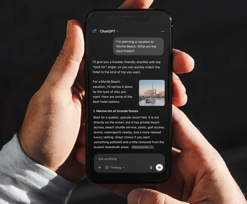 ChatGPT hotel search results showing Marina Inn at Grande Dunes on a smartphone