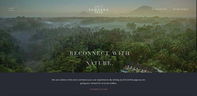 A serene landscape featuring lush greenery and mountains, with a text overlay promoting reconnection with nature.