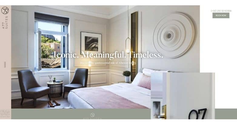 A stylish hotel room featuring a bed with pink accents, modern decor, and a window view. Text highlights "Iconic. Meaningful. Timeless."