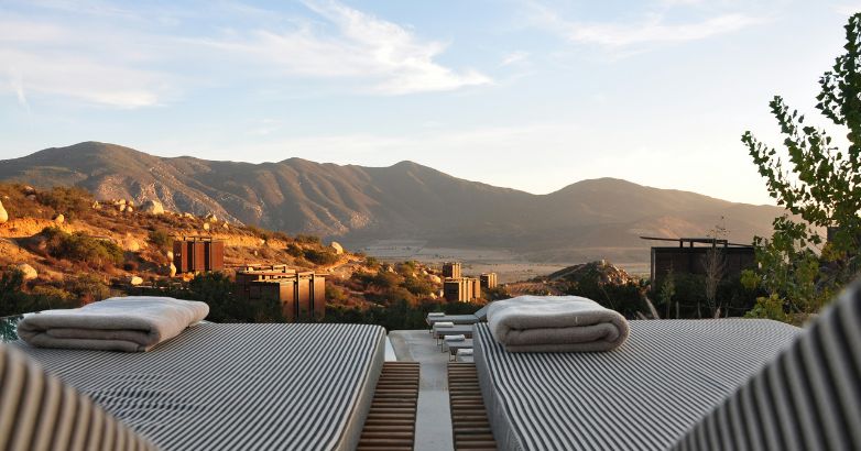 Mountain resort spa relaxation area with a serene view, emphasizing the performance of SEO strategies in the luxury hotel sector