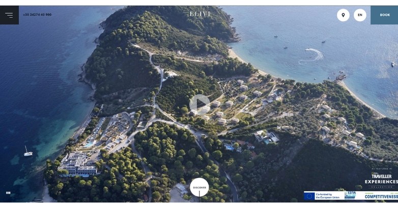 A website displaying a scenic view of Elivi Hotels resort, highlighting modern hotel design trends.